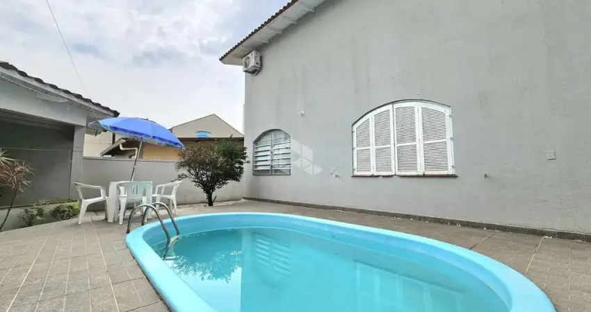 Casa sobrado à venda no bairro marechal rondon em canoas, 4 dormitórios, piscina e amplo pátio - aceita financiamento e fgts