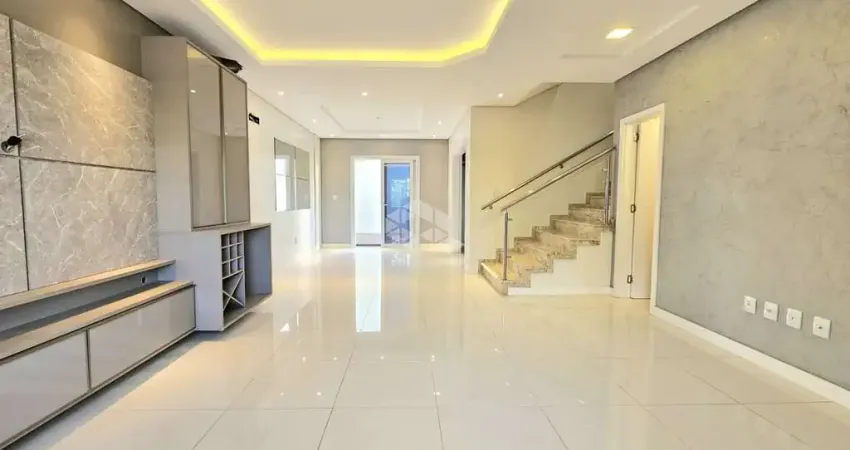 Casa com 4 dormitórios, sendo 3 suítes, vaga cobeta para 2 veículos, no Bairro Igara na cidade de Canoas. Aceita Financiamento Bancário e FGTS.