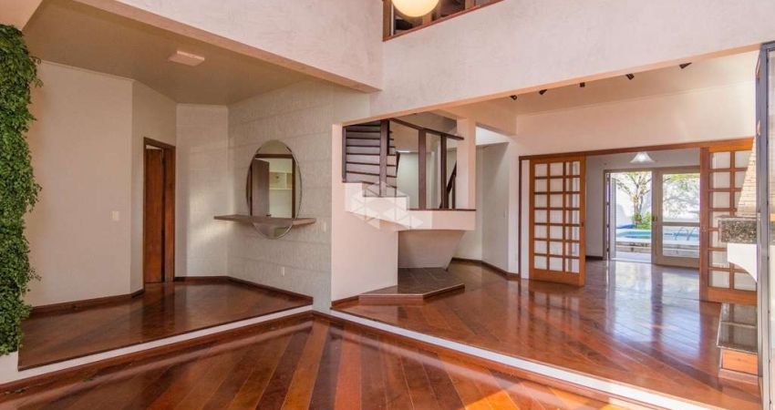 Casa 4 dormitórios, 4 suítes e com sacada, aceita financiamento no Bairro Jardim do Lago.