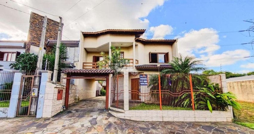 Casa sobrado com 168 m² em Canoas de 3 dormitório sendo 2 suíte, sala de estar,  cozinha, 1 banheiro na parte inferior, com  pátio e quiosque