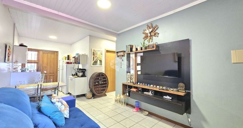 Casa térrea à venda no bairro São José, Canoas - 2 dormitórios, pátio, área gourmet e 2 vagas - Aceita financiamento e FGTS