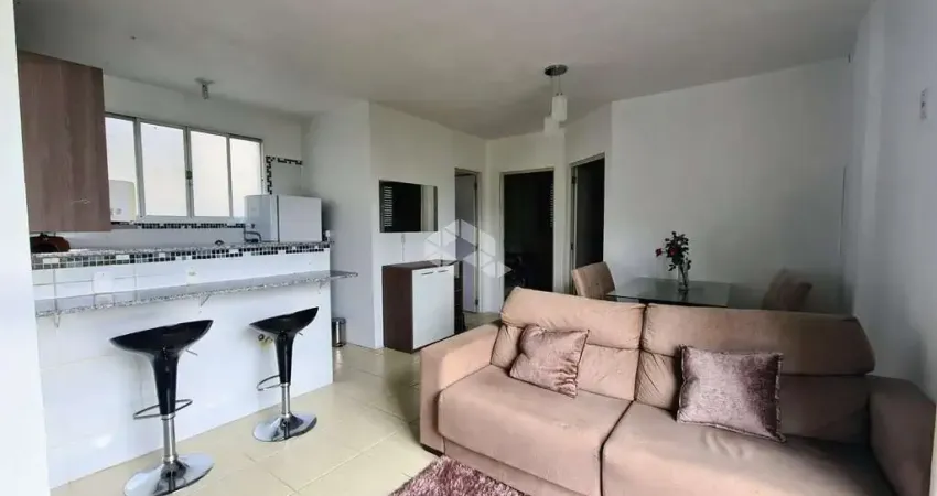 Apartamento com 2 dormitórios, 1 banheiro, 1 vaga de garagem, cozinha americana, mobiliado