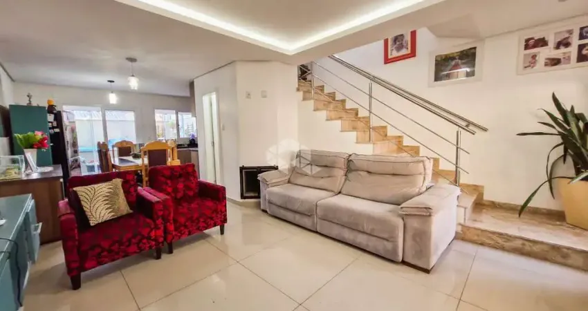 Casa sobrado, 3 dormitórios, 1 suíte, 1 lavabo, 2 vagas, piscina, lareira, churrasqueira e sacada, no igara/canoas, aceita fgts e financiamento.