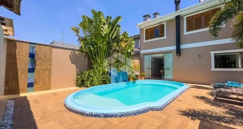 Casa com 3 dormitórios 2 suites e 4 vagas no bairro marechal rondon em canoas rs