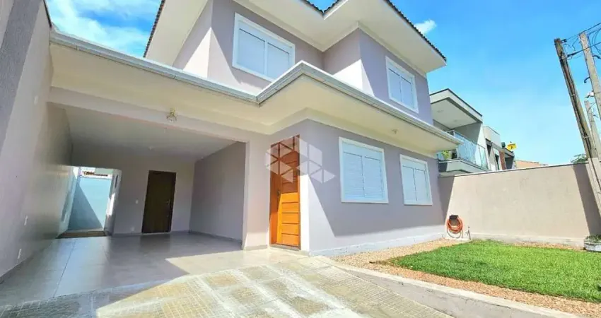 Casa de 3 dormitórios com 1 suíte e 2 vagas de garagem no bairro Igara em Canoas