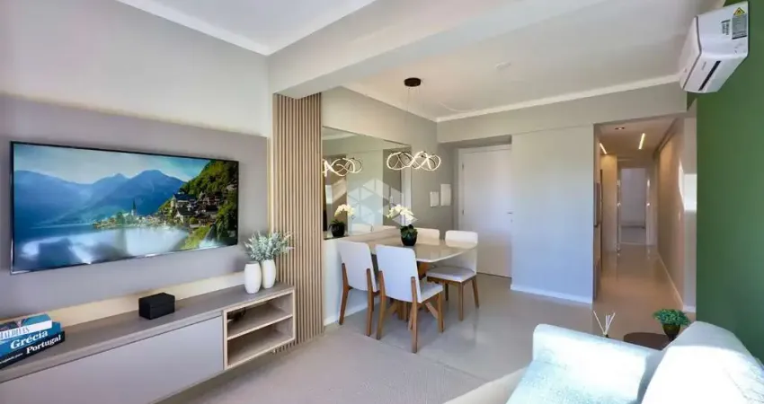 APARTAMENTO À VENDA EM CAPÃO DA CANOA, SACADA DE FRENTE COM TERRAÇO