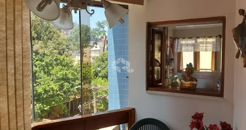 Apartamento 2 dormitórios, 1 suíte, banheiro social, box de garagem, em capão da canoa