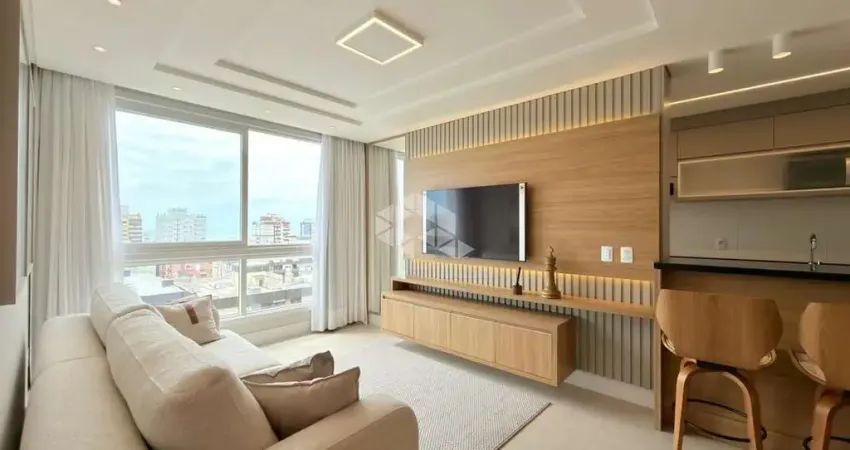 Apartamento mobiliado e decorado composto por 2 quartos(sendo 1 suíte), no Centro de Capão da Canoa/RS.