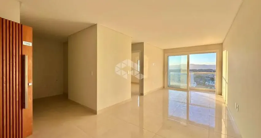 Apartamento de 2 dormitórios com vista definida e liberada para serra e box/vaga de garagem no centro de capão da canoa