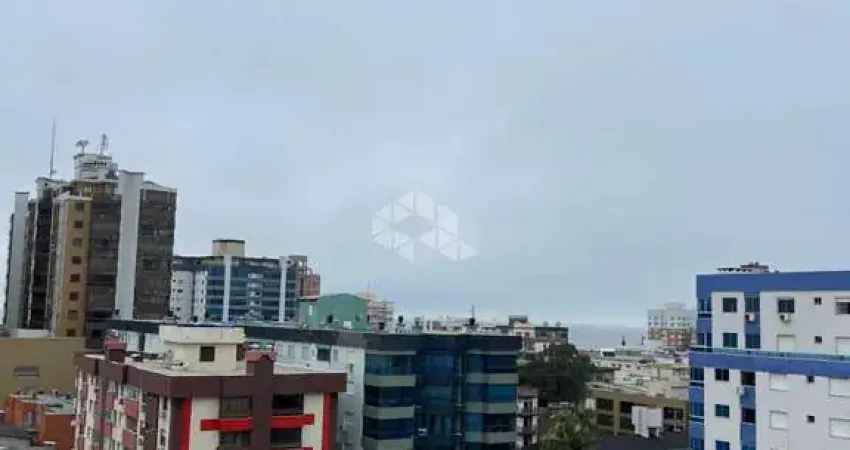No centro dois dormitórios mobiliado novo em Capão da Canoa RS