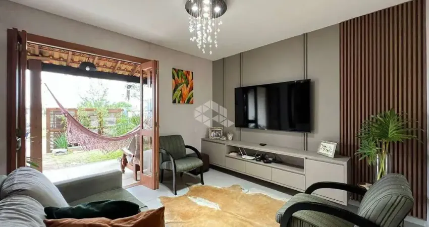 Sobrado geminado com 3 dorm/ 2 suítes - na praia guarani em capão da canoa