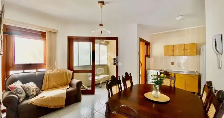 Apartamento 02 dormitórios, mobiliado, Sacada com churrasqueira, Banheiro Social, sala estar e jantar.