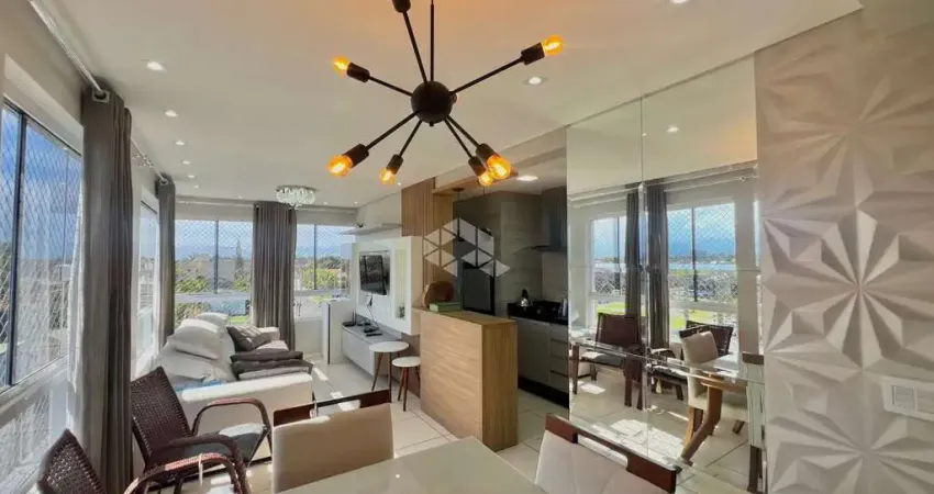 Apartamento mobiliado, 3 quartos(sendo 01 suíte), 1 box/vaga, no centro de capão da canoa.