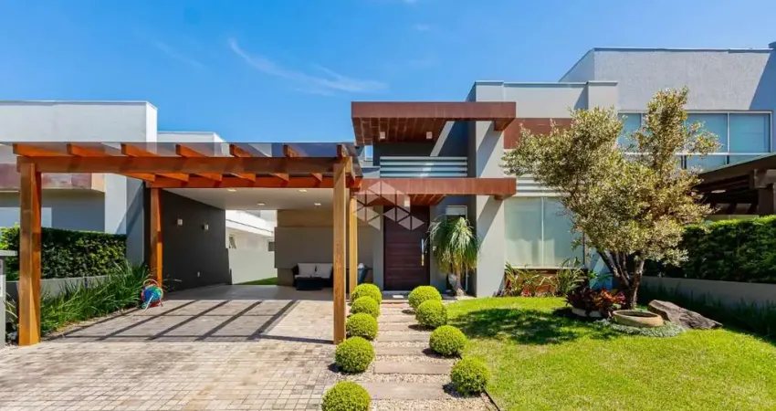 Casa térrea com 3 suítes próxima a toda infra no condomínio condado de capão da canoa