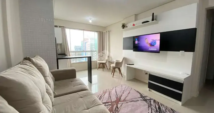 Apartamento de 2 dormitórios mobiliado com box de garagem junto a praça israelita na zona nova em capão da canoa