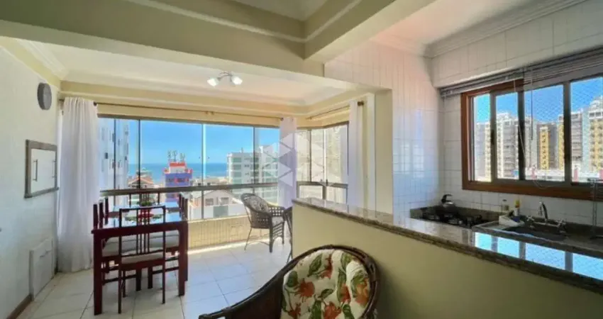 Apartamento de 3 dormitórios com vista mar mobiliado com box/vaga de garagem no centro de capão da canoa