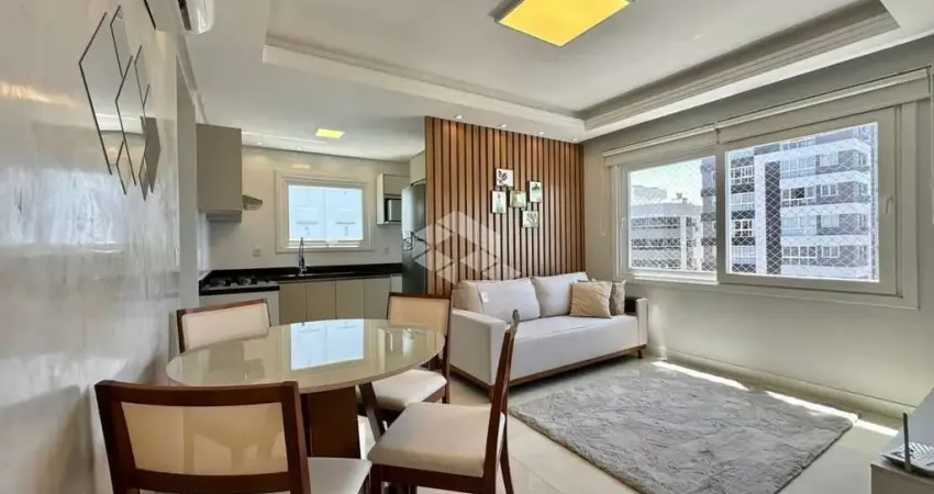 Apartamento de 2 quartos 1 suíte mobiliado com box/vaga de garagem em capão da canoa