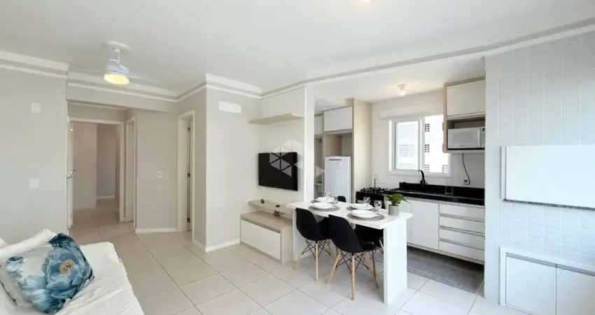 Apartamento 2 dormitórios/quartos de frente c/sacada e 2 box/vaga de garagem na Zona Nova em Capão da Canoa