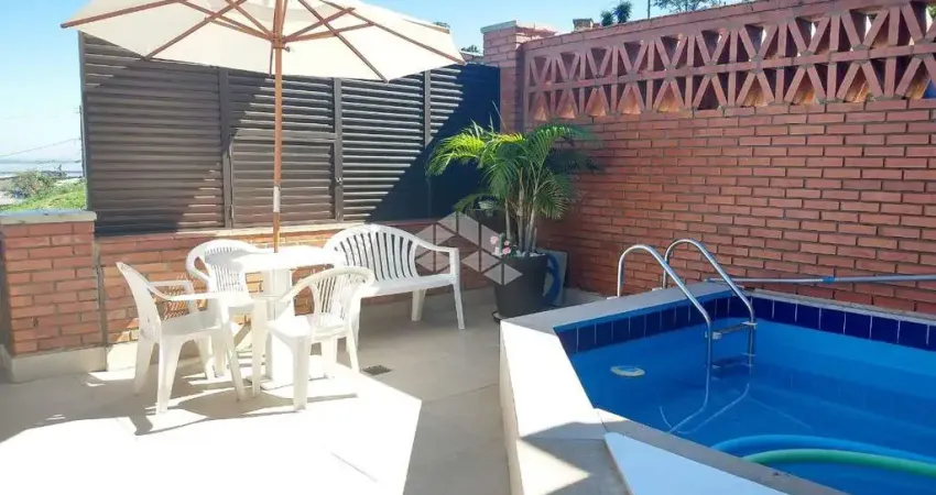 Casa em condomínio fechado com 3 quartos à venda na Avenida Jacuí, 978, Cristal, Porto Alegre