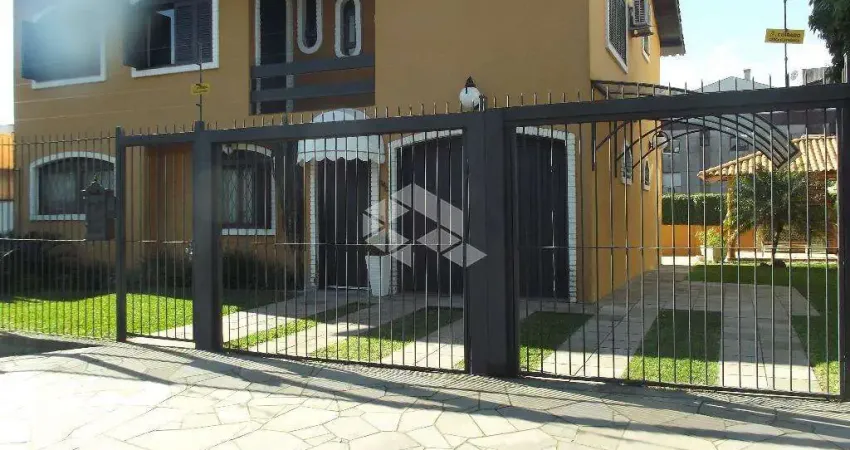 Casa com 3 quartos à venda na Rua Inhanduí, 340, Cristal, Porto Alegre