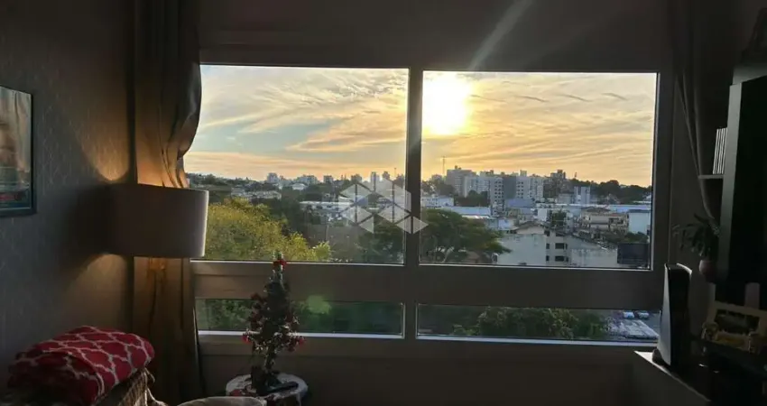 Dois dormitórios, semi mobilidado em andar alto com vaga para dois carros