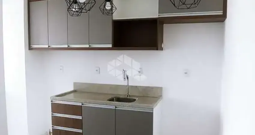 APARTAMENTO SEMIMOBILIADO COM 1 DORMITÓRIO E 1 VAGA ROTATIVA NO BAIRRO LOURDES EM CAXIAS DO SUL