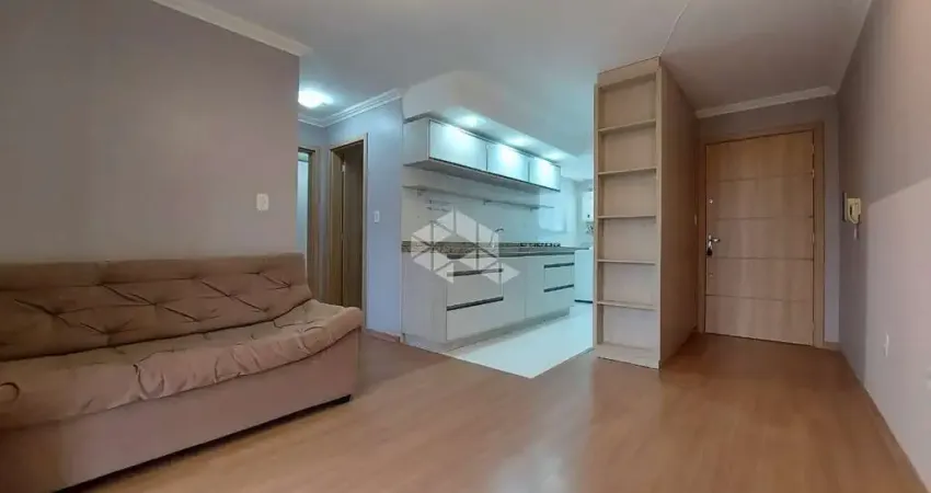 Apartamento à venda com dois dormitórios, um banheiro e vaga de garagem