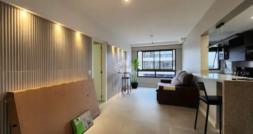 Apartamento 2 dormitórios, suíte, vaga escriturada, no Cristo Redentor em Porto Alegre.