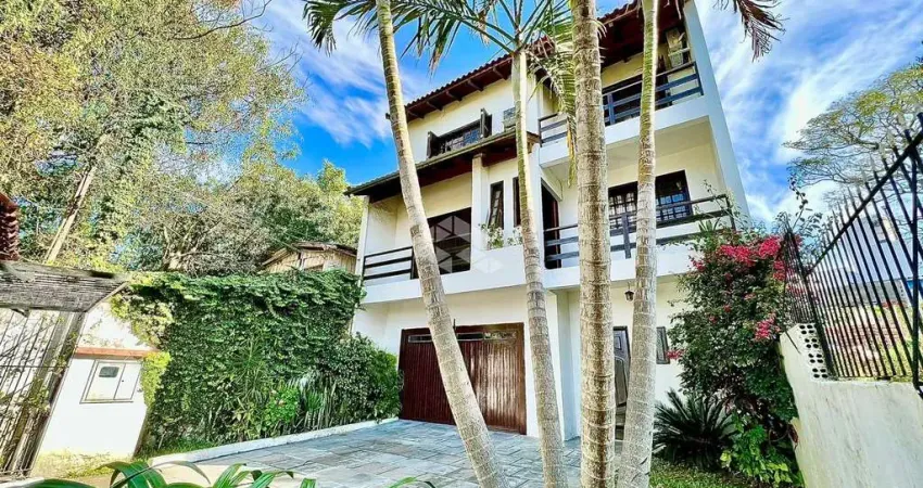 Casa com 4 quartos à venda na Rua Barão de Bagé, 810, Vila Jardim, Porto Alegre