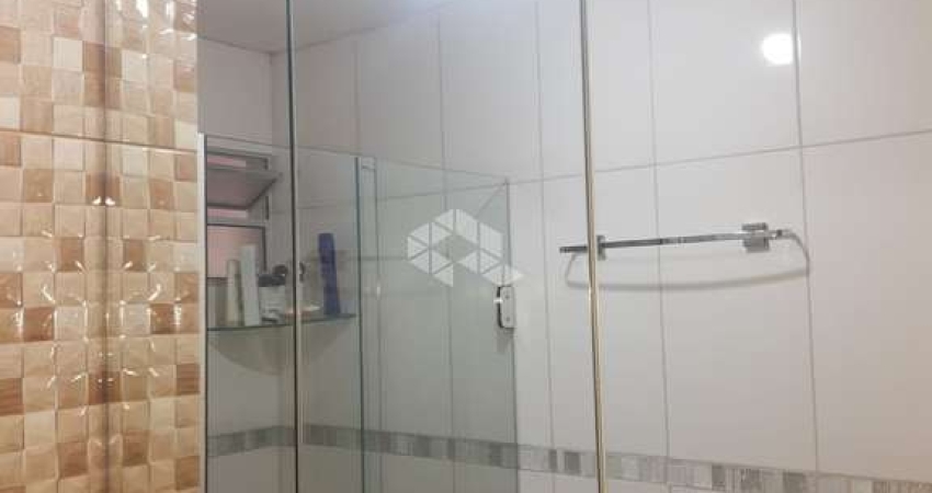 Seu Refúgio Acolhedor: Apartamento Térreo de 2 Dormitórios no Bairro Santos Dumont
