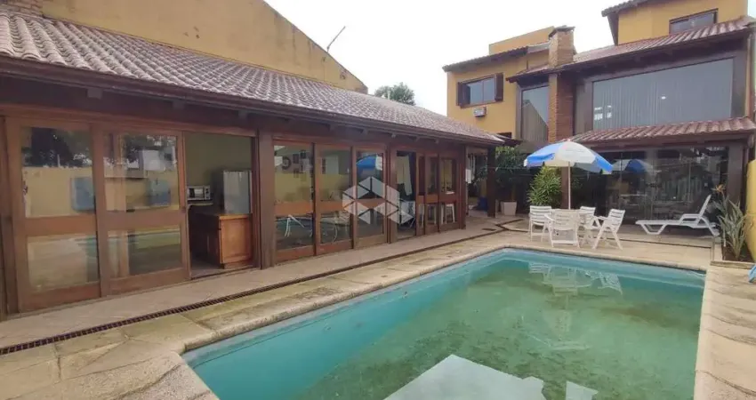 Casa com 4 quartos à venda na Rua Jorge Salis Goulart, 138, Jardim São Pedro, Porto Alegre