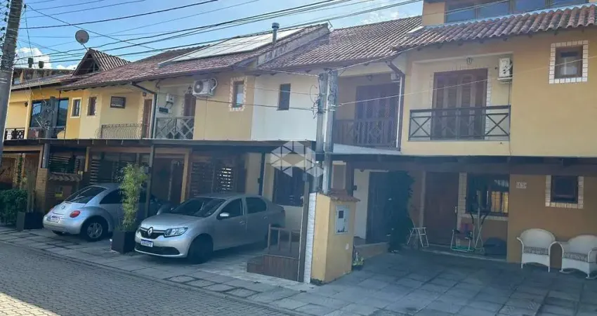 Casa em condomínio fechado com 2 quartos à venda na Avenida Edgar Pires de Castro, 1286, Hípica, Porto Alegre
