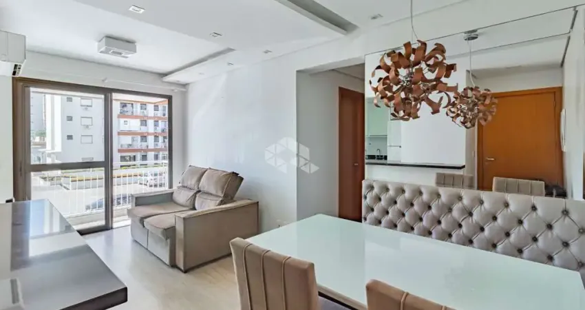 Apartamento de 2 dormitórios com suíte, sacada e churrasqueira, 1 vaga de garagem no bairro Passo da Areia