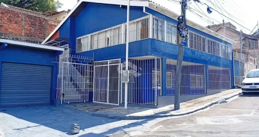 Casa com 4 quartos à venda na Avenida Economista Nilo Wulff, 169, Restinga, Porto Alegre