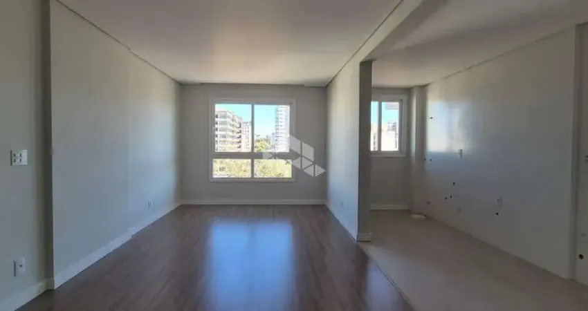Apartamento dois dormitórios/ suíte no centro de farroupilha