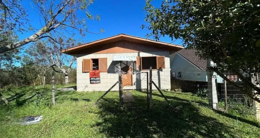Casa de madeira com 63m2, sendo 3 dormitórios no bairro américa.