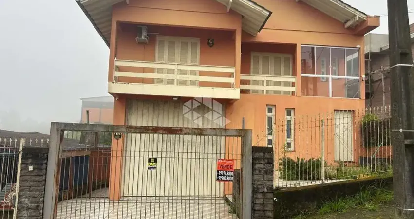 Casa em alvenaria com 3 dormitórios sendo 1 suíte no bairro america