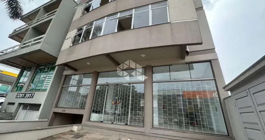 Prédio residencial e comercial no centro de farroupilha. 03 apartamentos de 03 quartos com suíte e garagem. e uma sala comercial