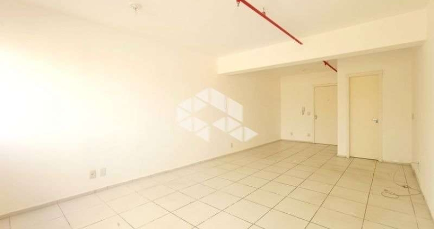 Sala - conjunto comercial com vaga de garagem à venda no bairro Partenon em Porto Alegre.
