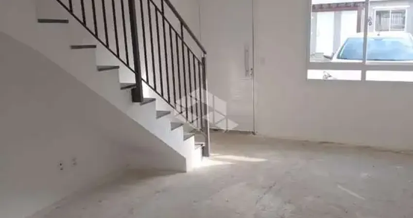 Casa NOVA em CONDOMÍNIO à venda de 2 quartos e vaga de garagem no bairro Vila Nova em Porto Alegre - RS.