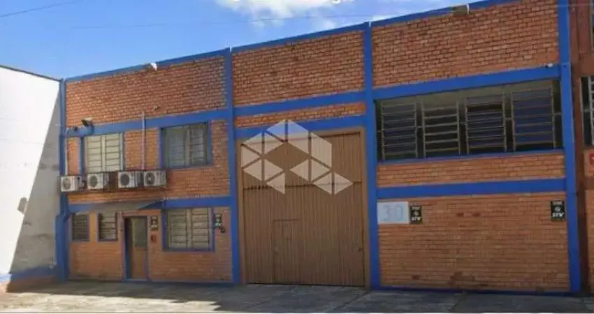 Depósito com 430 m2 com mezanino para escritório com 50 m2 de área, 3 banheiros e 4 vagas localizado no bairro anchieta em porto alegre.