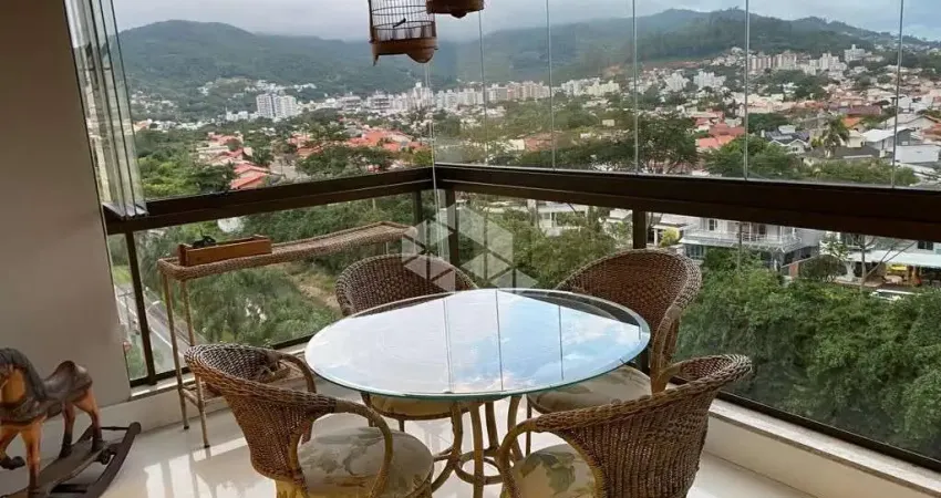 Apartamento semimobiliado com vista panorâmica, 3 dormitórios, sendo 1 suíte, 2 vagas -  Itacorubi, Fpolis SC