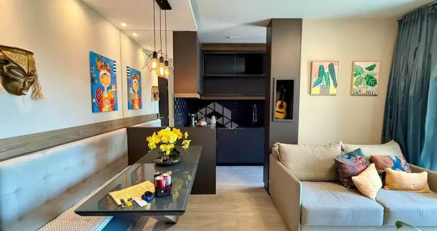 APARTAMENTO MOBILIADO DE 1 QUARTO SENDO SUÍTE COM 2 VAGAS E SACADA NA PRAIA COMPRIDA SÃO JOSÉ