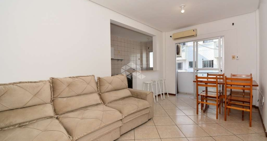 APARTAMENTO DUPLEX  MOBILIADO COM 3 QUARTOS SENDO 1 SUÍTE E 2 VAGAS DE GARAGEM NA TRINDADE FLORIANÓPOLIS