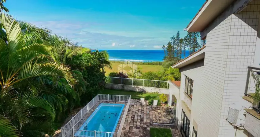 CASA DE ALTO PADRÃO COM 6 QUARTOS SENDO 4 SUÍTES 4 VAGAS DE GARAGEM VISTA PARA O MAR NO MORRO DAS PEDRAS FLORIANÓPOLIS