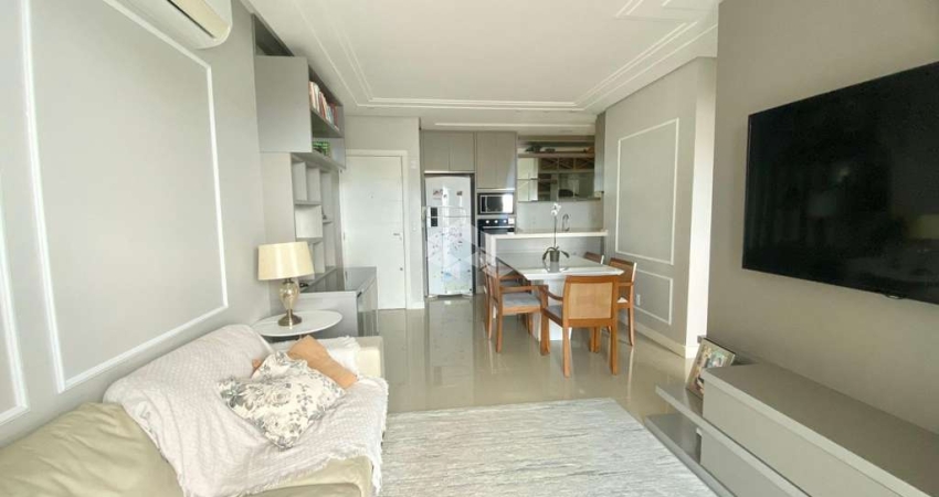 APARTAMENTO COM 2 QUARTOS SENDO 1 SUÍTE SEMIMOBILIADO SACADA COM CHURRASQUEIRA E VISTA PARCIAL DO MAR EM BARREIROS SÃO JOSÉ