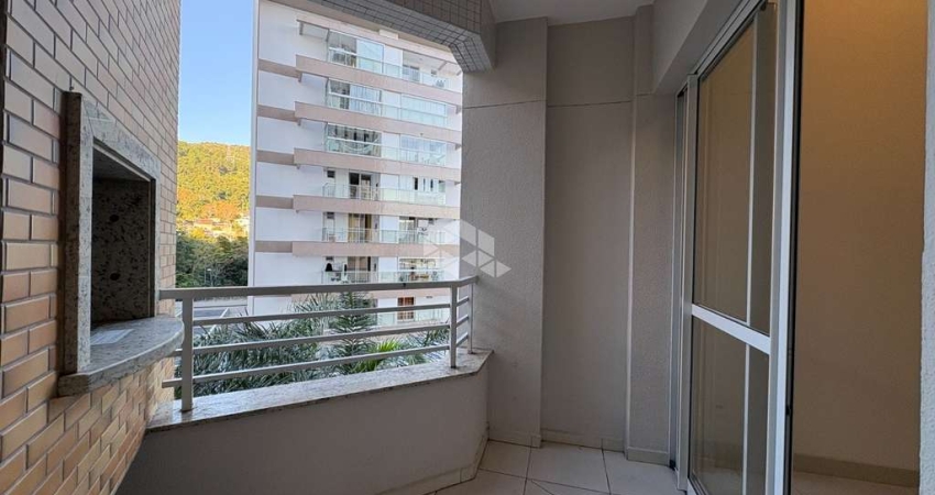 APARTAMENTO COM 2 QUARTOS SENDO 1 SUÍTE COM SACADA E CHURRASQUEIRA NO ITACORUBI EM CONDOMÍNIO COMPLETO