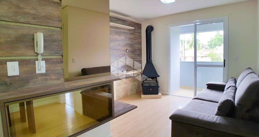 Apartamento de 2 dormitóros com suíte no centro, otima posição solar