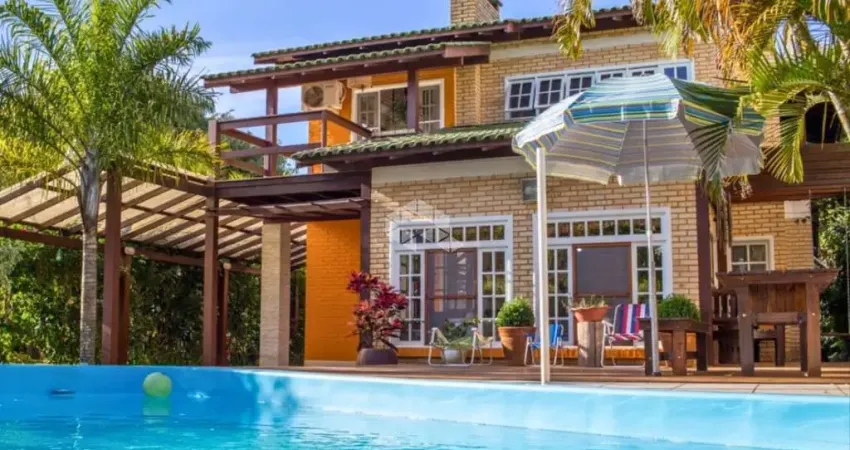 Casa à venda em condomínio fechado em Ibiraquera - Imbituba/SC com 4 dormitórios
