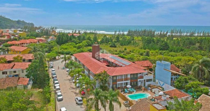 Pousada á venda na Praia da Ferrugem a 50 metros da areia.